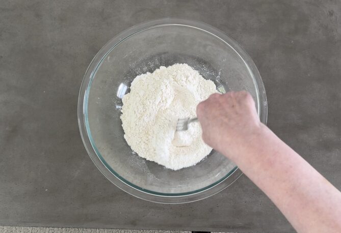Mixing a bowl of flour