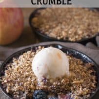 A scoop of ice cream on top of a crumble dessert