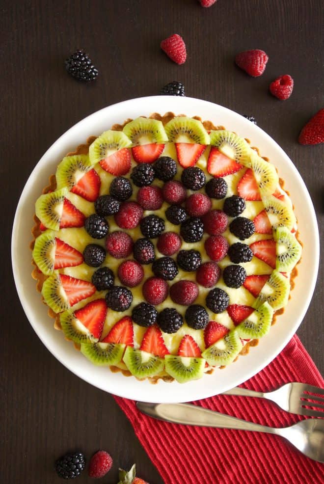 The tart viewed from overhead with berries around