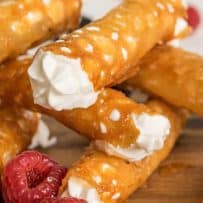 Lacy tubes filled with whipped cream