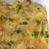 A crispy breadcrumb topping on top of a cheese sauce with leeks