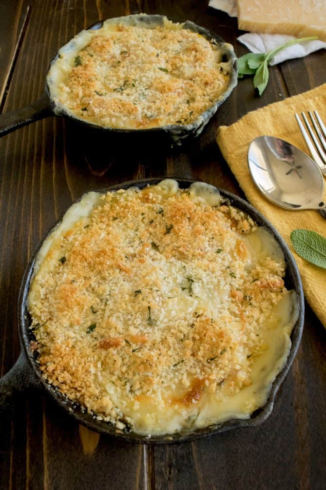 2 butternut squash and sage gratins in mini cast iron skillets