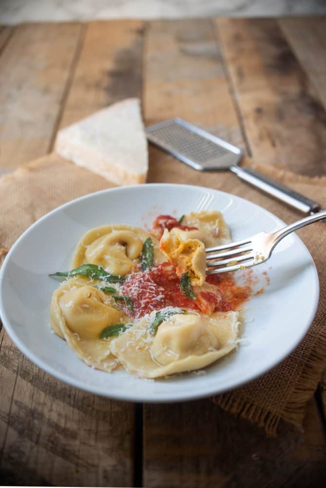 A butternut squash filled pasta on a fork