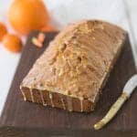 Carrot ginger spiced bread (done)-Carrot ginger spiced bread (done)-Carrot Ginger Spiced Bread with a knife ready to be sliced