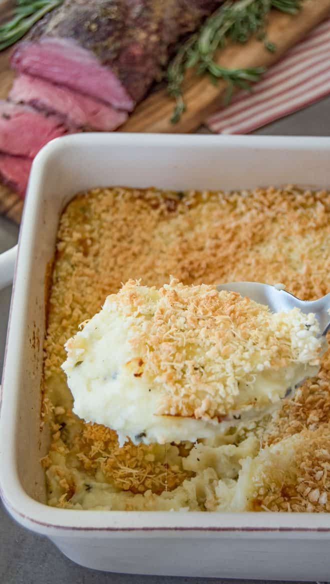 A spoonful of cheesy rosemary mashed potatoes