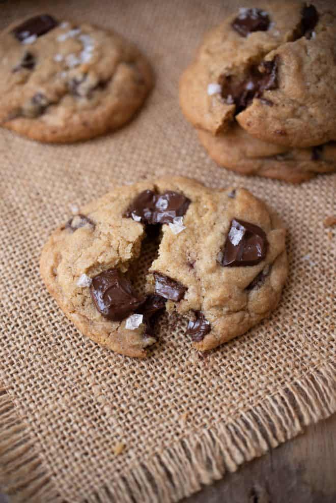 A chocolate chunk cookie pulled apart showing all the chocolate inside