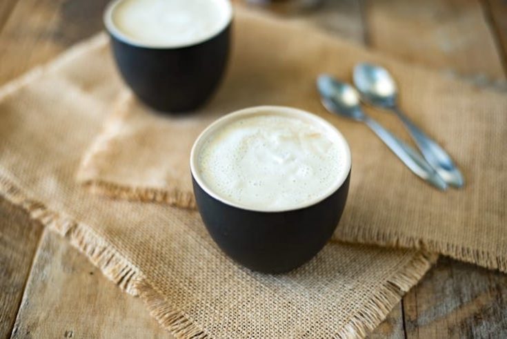 This creamy almond coconut cashew coffee will be your new chilly morning wake-me-up drink that is dairy free. Healthy almond milk is blended and thickened with coconut oil, cashews and a little honey for a creamy coffee creamer. This is Bulletproof coffee meets healthy latte.