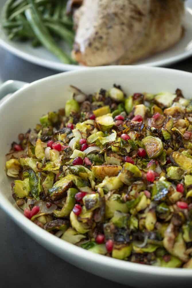 A closeup of crispy and browned shredded Brussels sprouts
