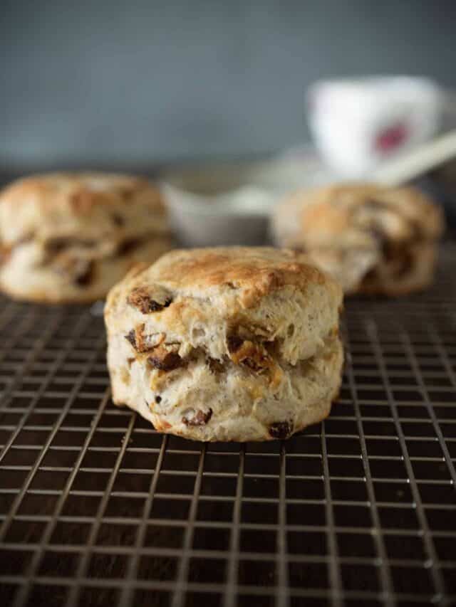 A side view of a scone showing the dates and apple