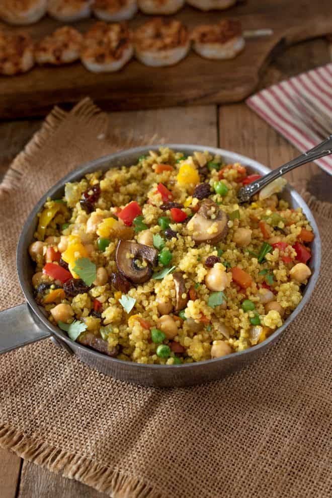 A pan of colorful curry vegetable quinoa