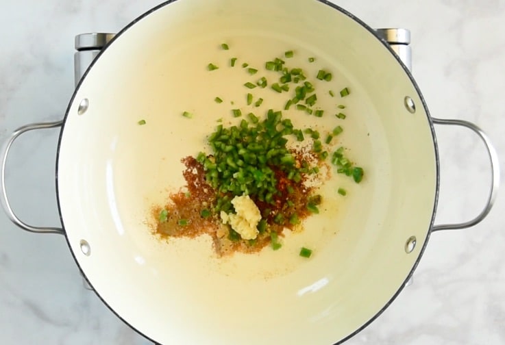 Indian spices green chili's and garlic are cooked in oil