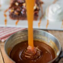 Pouring salted caramel sauce into a pan