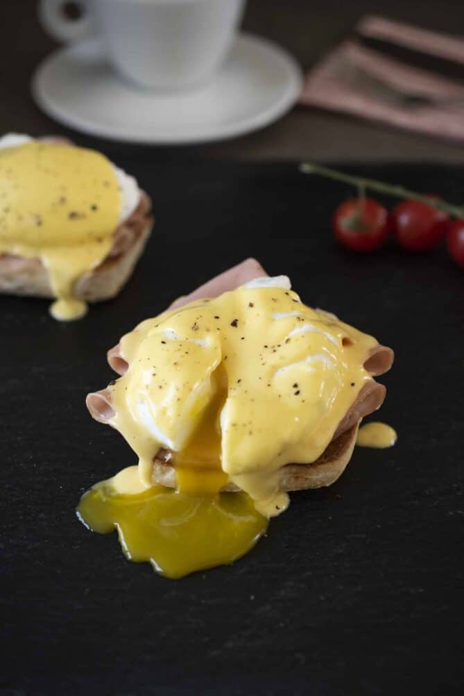 Egg yolk spilling out of a poached egg