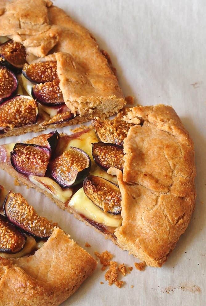 Flaky pastry galette with a filling of brie and fresh fig wedges