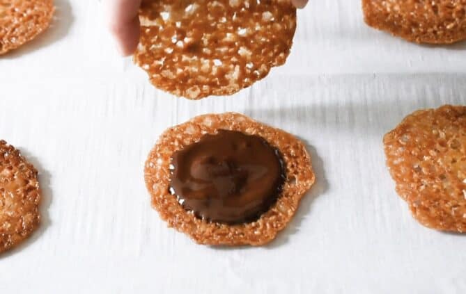 Lace cookie coated with melted chocolate