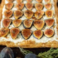 The uncut tart on a serving tray