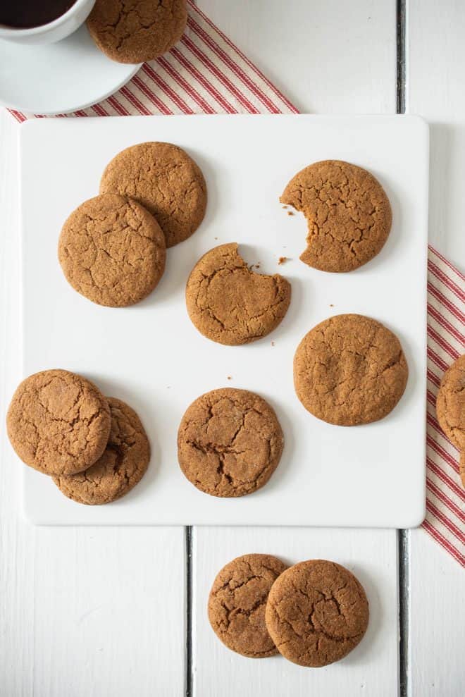 A selection of Ginger Snaps a.k.a Ginger Nuts on a white square plate