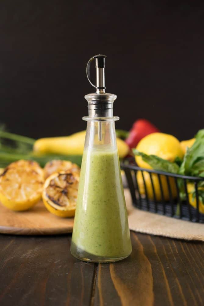 A bottle of dressing viewed from the side