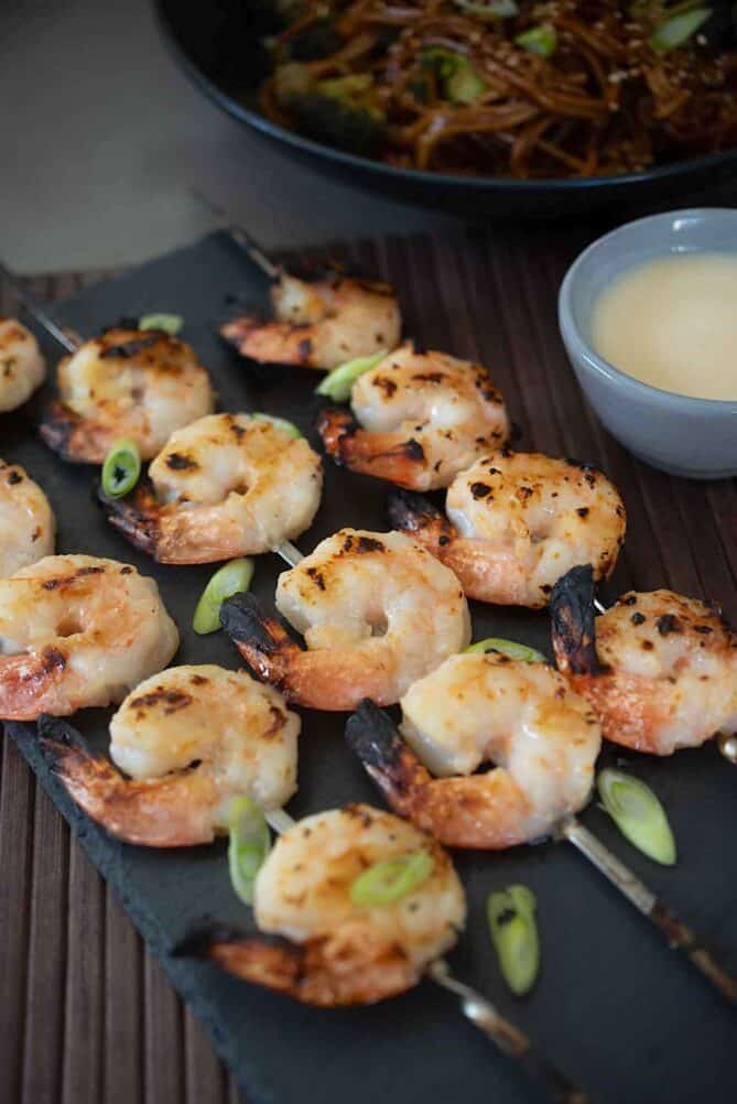 3 skewers of grilled shrimp