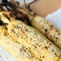 Corn cobs coated in fresh Parmesan, butter, garlic and basil.