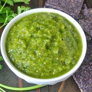 This grilled salsa verde is not your average salsa verde. Grilled tomatillos, pasilla peppers and jalapeño with added sweetness from pineapple. This  is a salsa so full of flavor you'll find it hard to put down the tortilla chips.