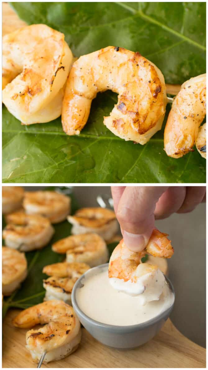 Dipping grilled shrimp into ginger lemon sauce