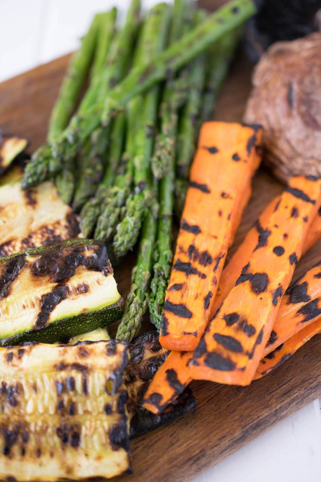 A closeup of grilled vegetables showing the grill marks