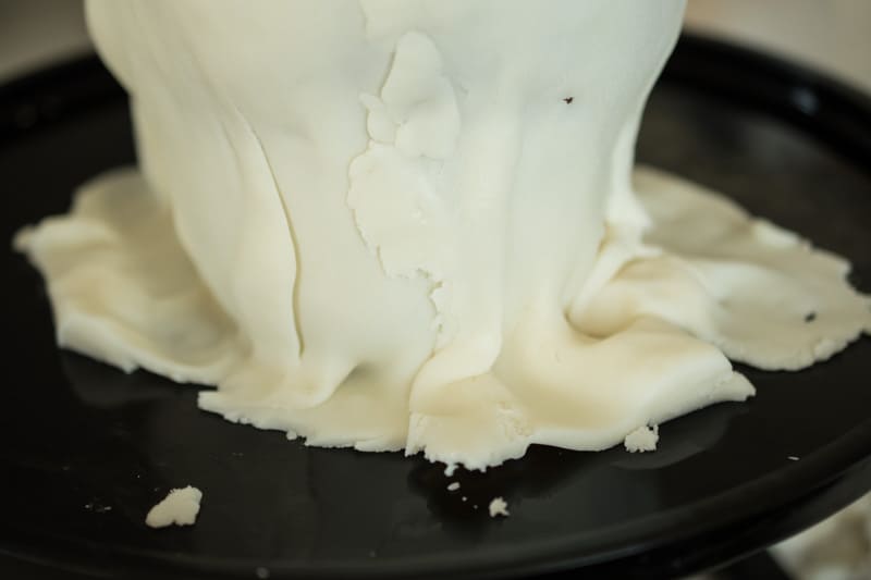 The back of the cake showing the folds of the fondant