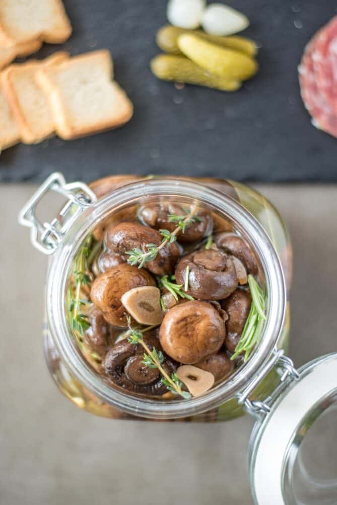 Viewed from overhead, a jar of mushrooms