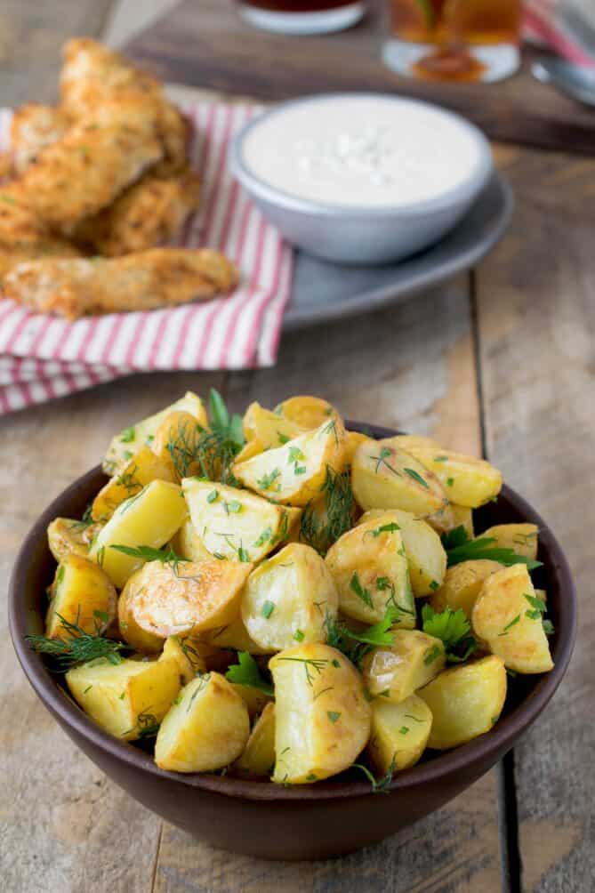 A brown bowl filled with potato salad