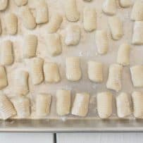 A closeup of gnocchi showing the ridges