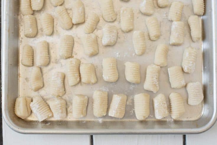 A closeup of gnocchi showing the ridges