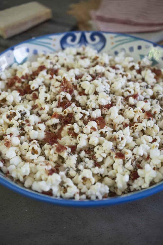 Popcorn with toppings in serving bowl