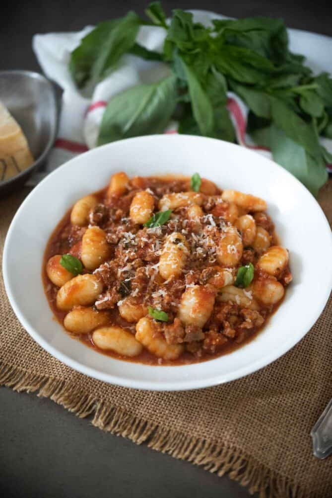 Ground Italian sausage pieces cooked in tomato sauce