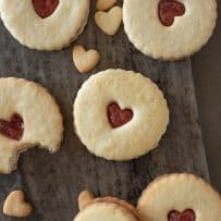 A selection of the cookies and 1 has a bite taken out