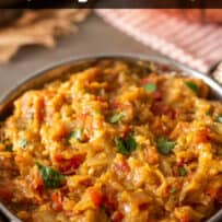 Eggplant, spices onion and cilantro mashed and served in a traditional Indian bowl