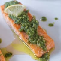 Roasted salmon served with lemon pesto sauce