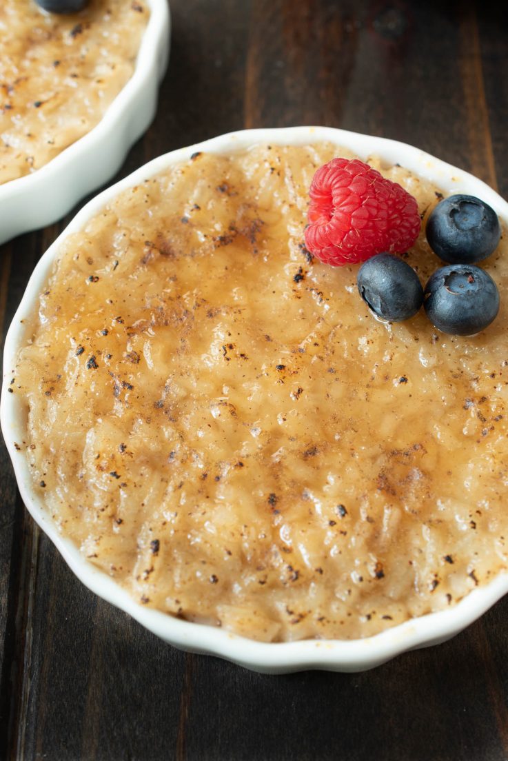 A closeup of the rice pudding with a browned, crispy brûléed top