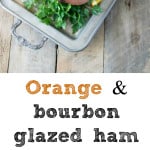 A glazed ham on a tray and a closeup of the cloves in the skin