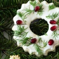 A closeup of the cooking showing the green leafy and pomegranate decoration