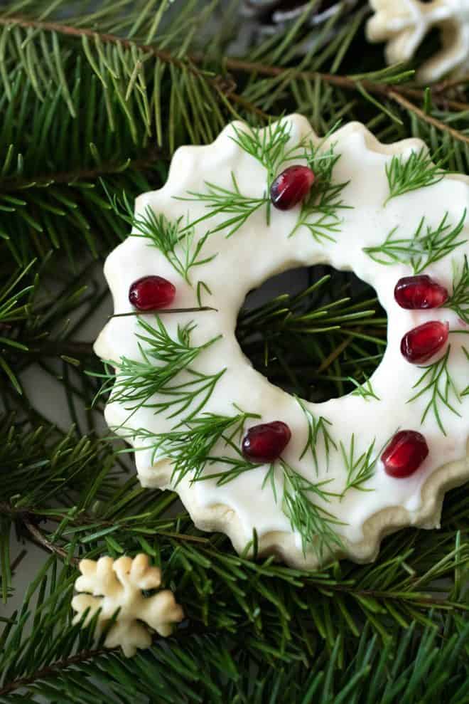 A closeup of the cooking showing the green leafy and pomegranate decoration