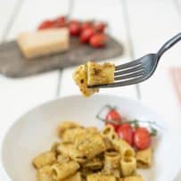 A fork full of pesto pasta