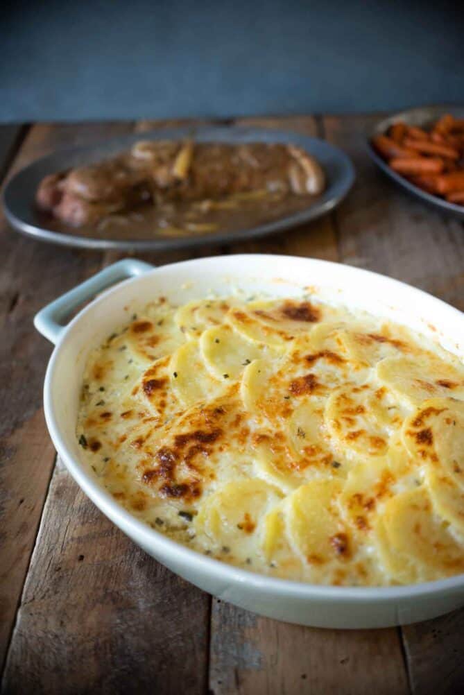 Potato and celery root gratin in a baking dish