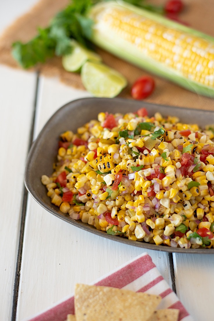 The salsa is in a bowl ready to be served with chips