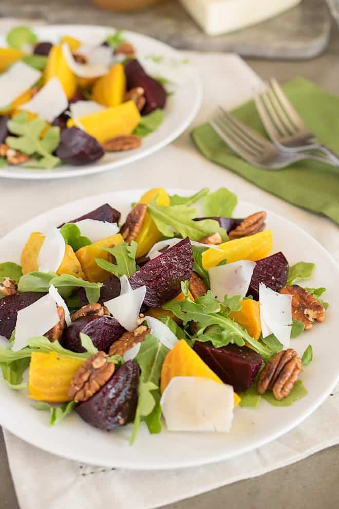 Red and gold beets with arugula, pecans and shaved cheese