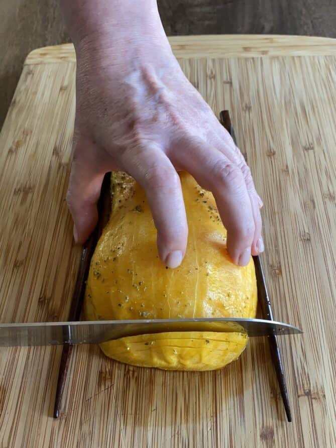 Slicing a butternut squash