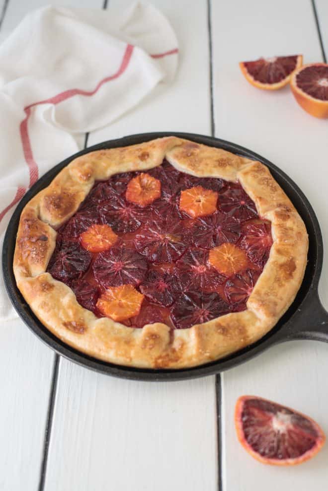A colorful Blood Orange Galette served on a cast iron skillet