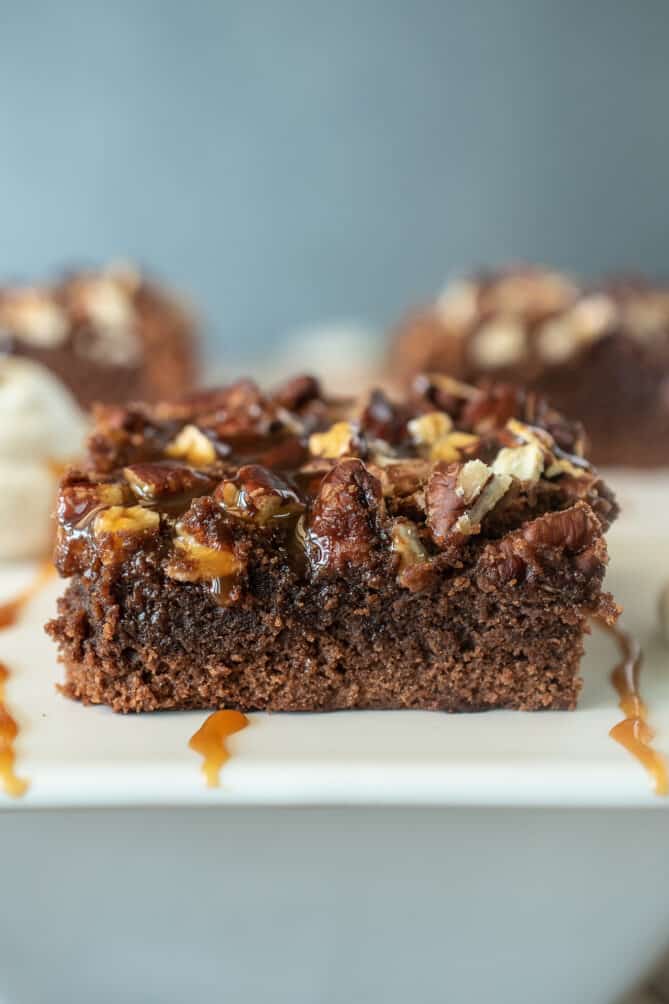 The side of the brownie showing the salted caramel sauce soaked into the brownie