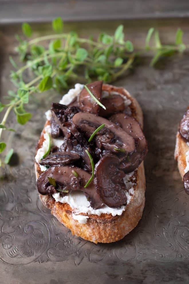 Sautéed mushrooms and rosemary with ricotta cheese on crusty bread