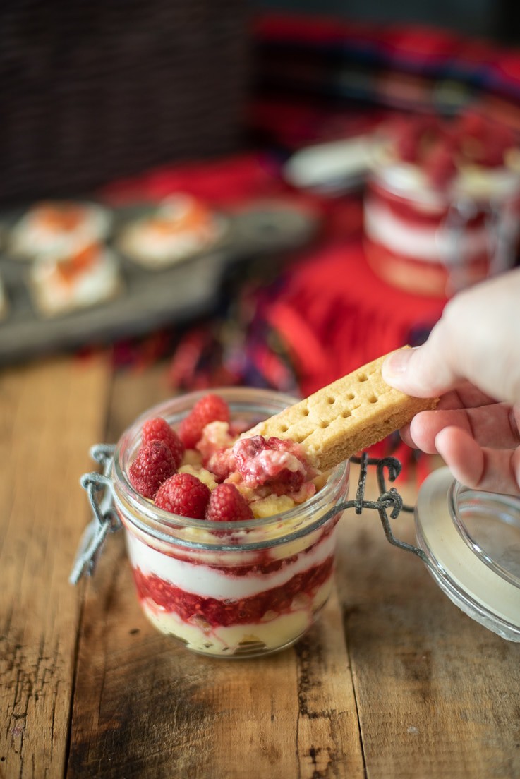 Dipping a Walkers shortbread cookie into the dip.